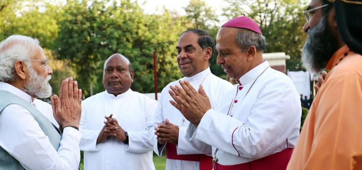 Modi with Priest