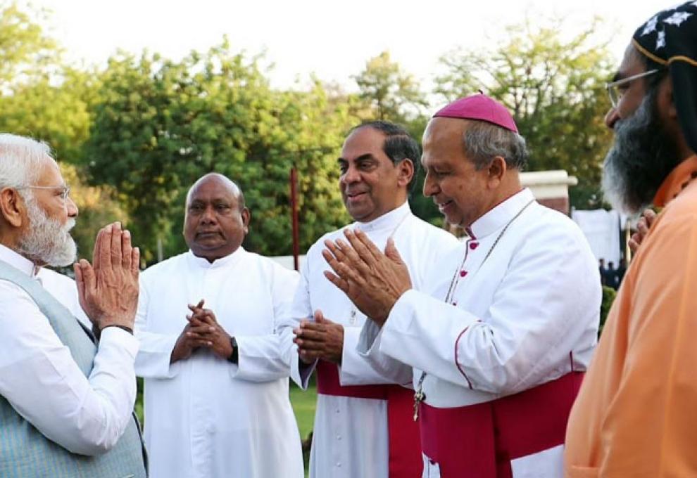 Modi with Priest