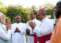 Modi with Priest