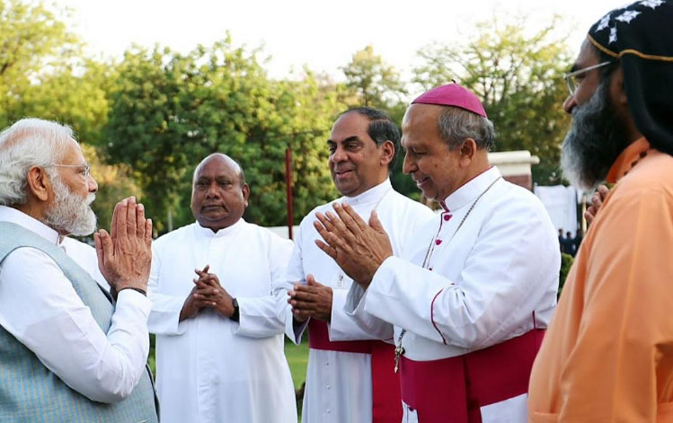 Modi with Priest
